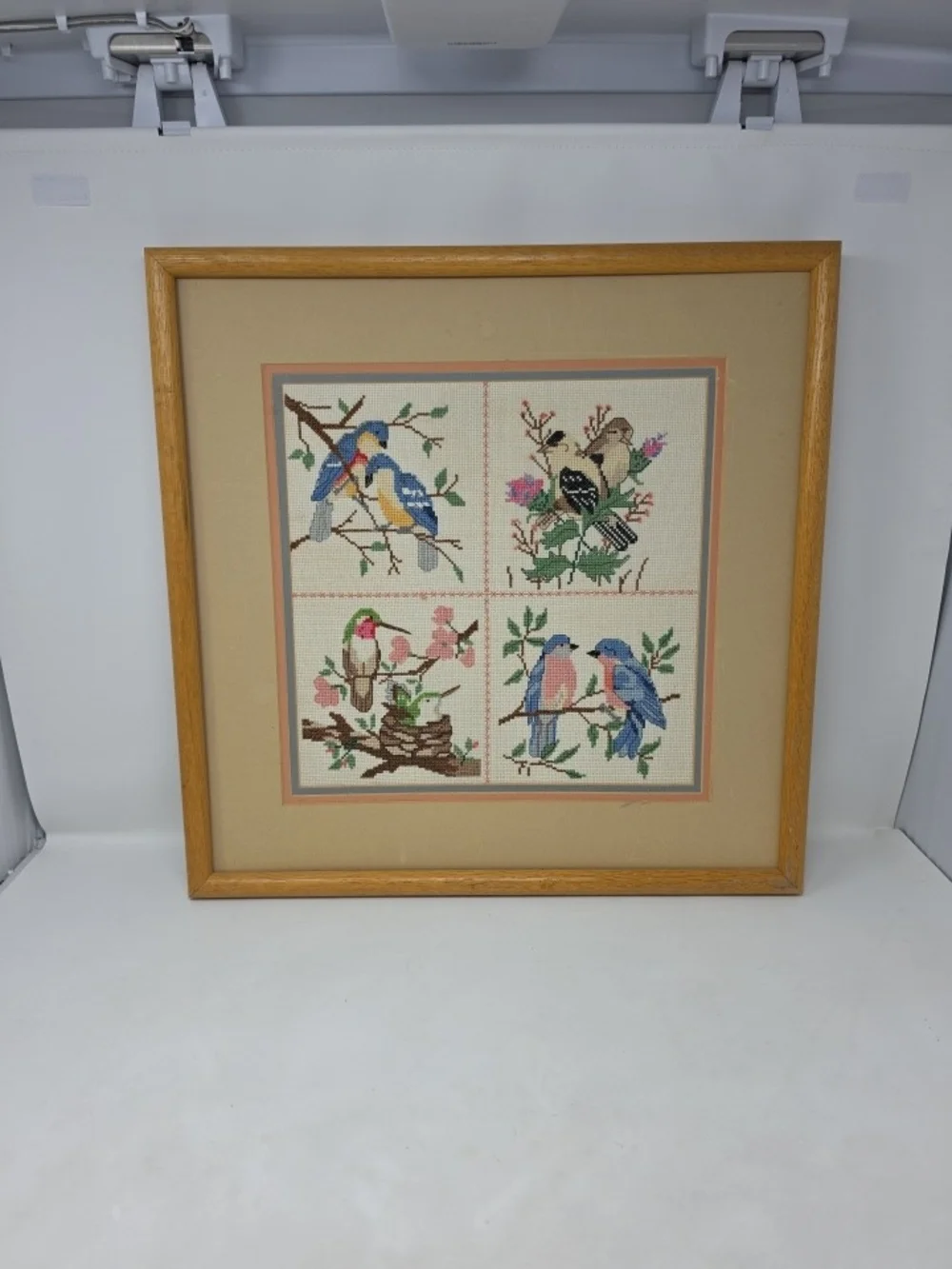 Framed Four-Panel Bird Cross-Stitch Wall Art in Blue, Pink & Green